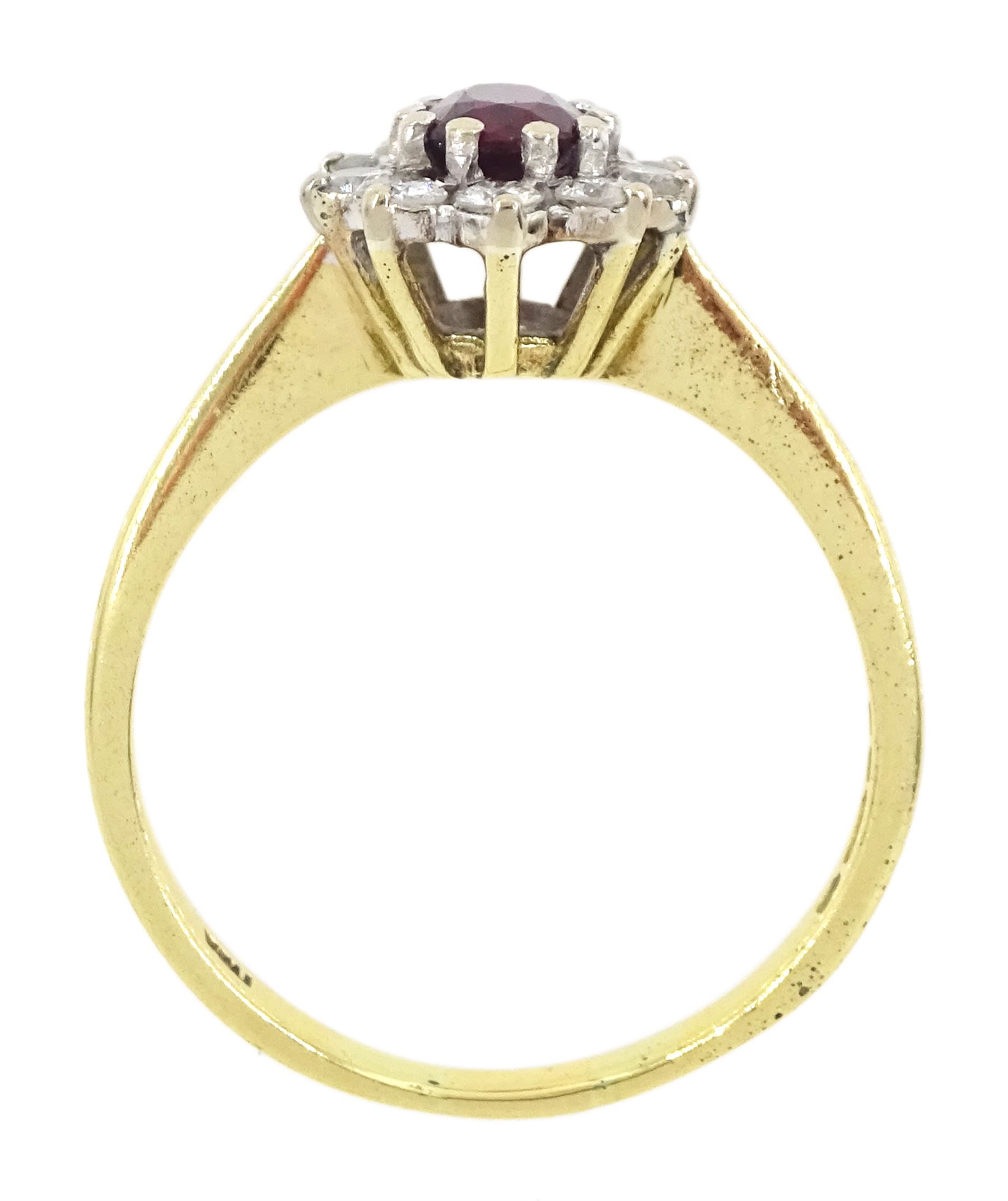 18ct gold oval cut ruby and round brilliant cut diamond cluster ring, London 1976, ruby approx 0.45 carat, total diamond weight approx 0.30 carat