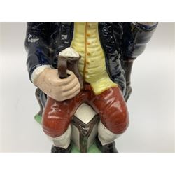 Early 20th century Staffordshire William Kent Squire toby jug, modelled seated upon a corner chair holding a jug of ale in his right hand, H28cm