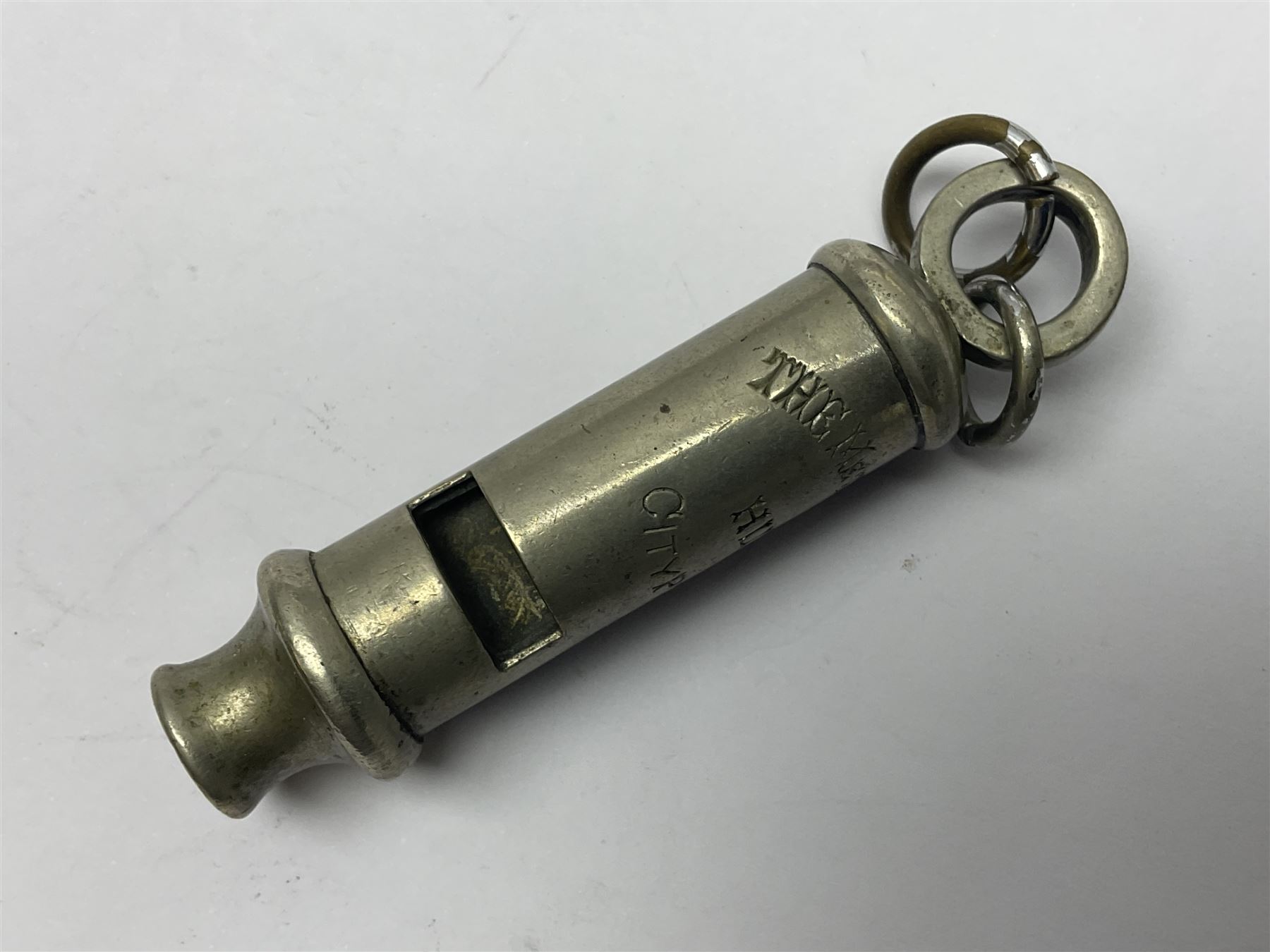 Hull police whistle, medal 'For Exemplary Police Service', three Jack Rigg prints, and a black and white photograph of Hull Dock Offices, 1903