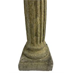 Classical design cast stone female bust depicting Artemis, raised on fluted Corinthian column with acanthus leaf capital, stepped square base, looking right 