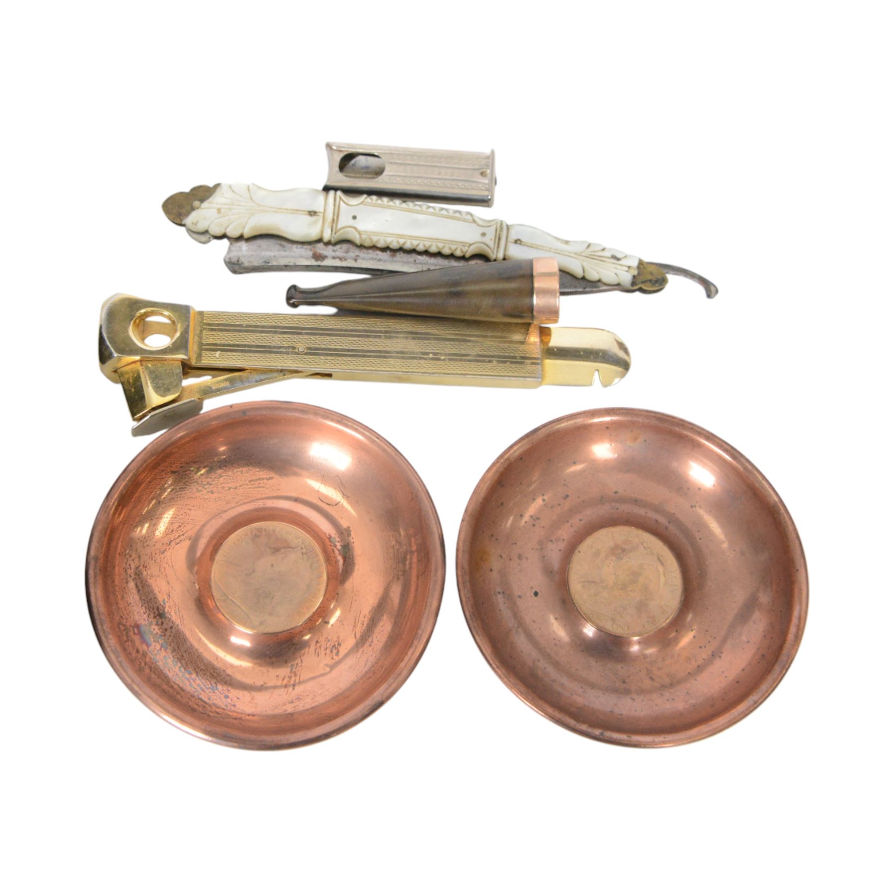 Cheroot holder with 9ct gold collar, silver cheroot holder, two cigar /cigarette cutters, two Victorian copper dishes set with Victorian penny, Otis King calculator and brassware, including folk art box, set of postage scales and Royal commemorative Prince Albert tobacco jar, match holder, etc