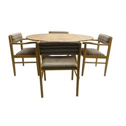Ercol - elm and beech 'drop-leaf dining table', oval top raised on splayed tapering supports (W113cm D62cm H72cm); and set of four dining carver chairs, upholstered in textured striped fabric