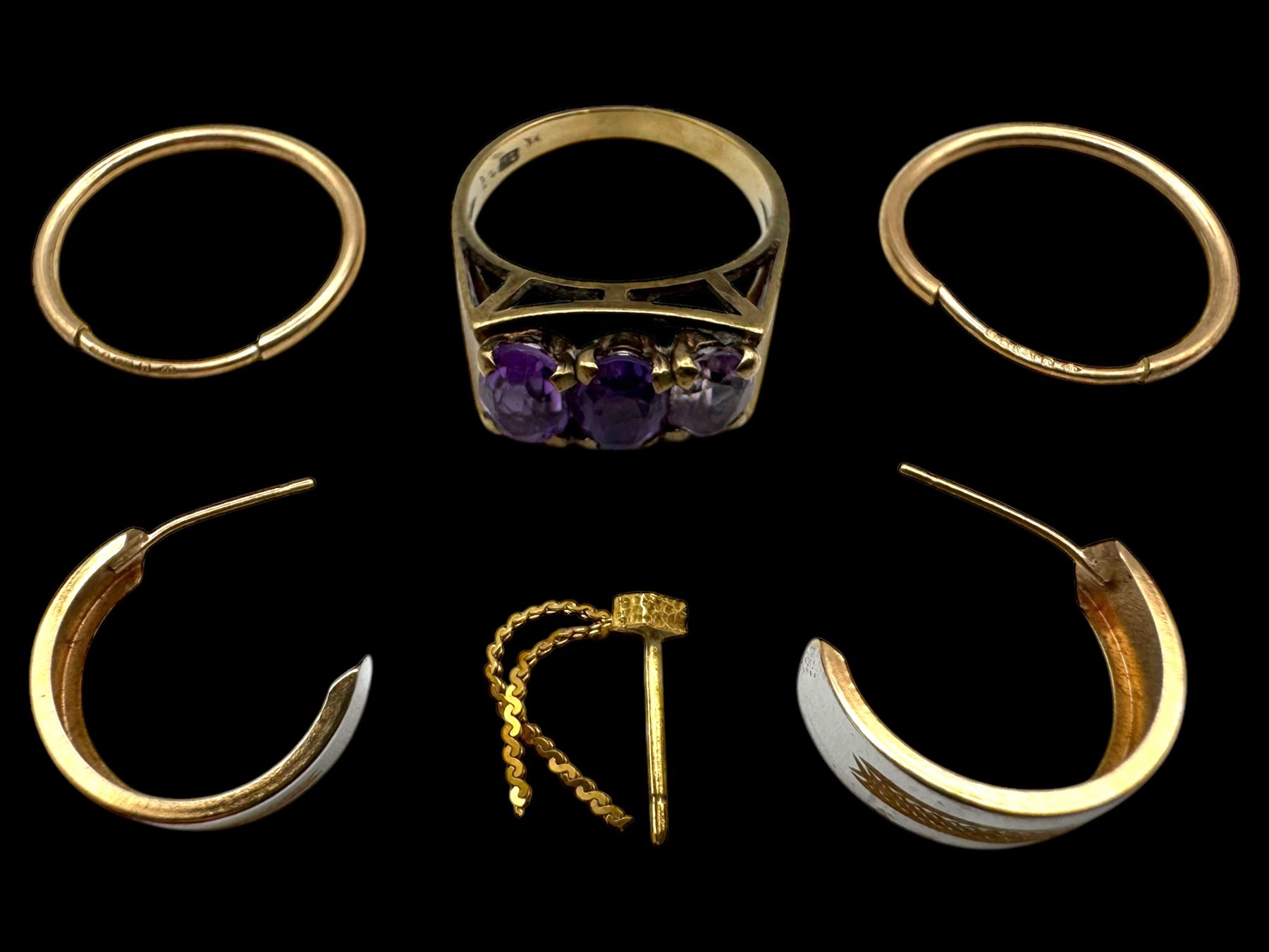 Two pairs of 9ct gold hoop earrings, three 9ct gold earring backs and an 8ct gold three stone ring