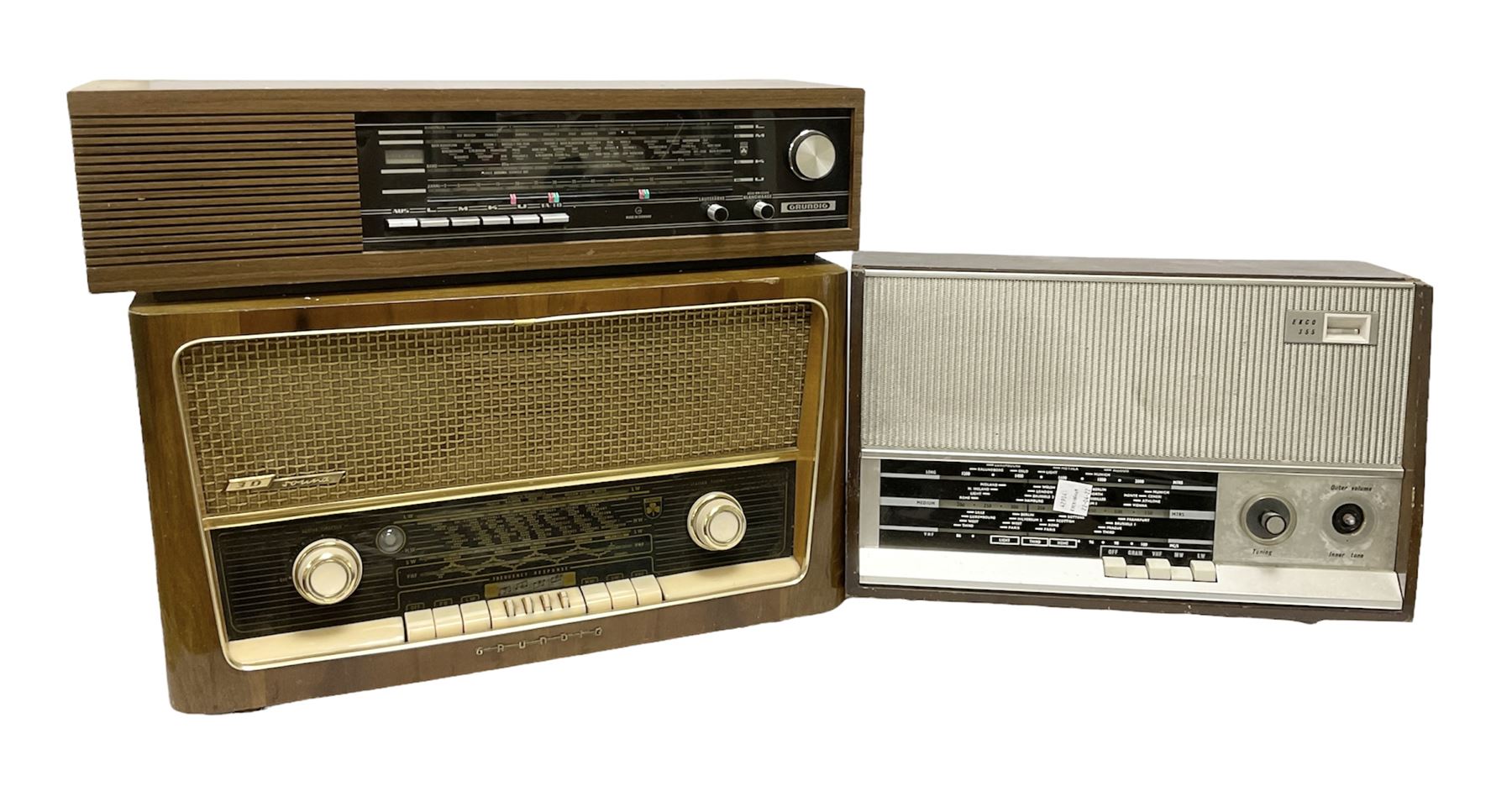 Three mid 20th century radios comprising 1950s Grundig wood cased valve radio model 3028/GB, together with a 1970s Grundig Type RF 153 CS 150 radio in teak case, and an Ekco 355 1960's valve radio, largest W60 H35cm D23cm