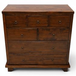 Willis & Gambier - 'Kerala' pair of chest, five short legs over two long drawers, raised on a plinth, above splayed legs