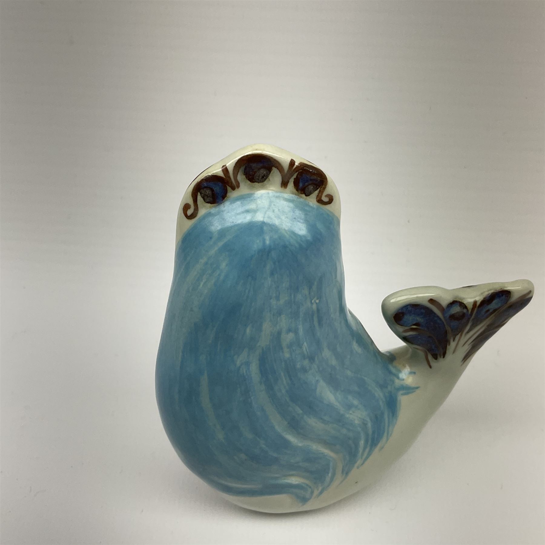 A Doreen Middelboe for Royal Copenhagen Aluminia figure, modelled as a mermaid, with printed and painted marks beneath, H10.5cm.