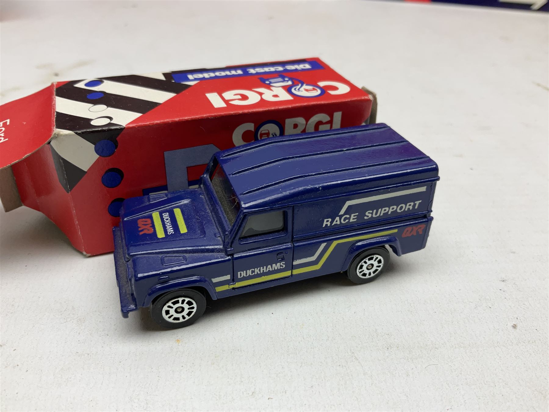 Corgi - thirty-four modern die-cast models including cars, commercial vehicles, racing cars, sports cars, car transporters etc; all boxed; Bburago boxed set of five cars; four Matchbox Originals blister packs etc