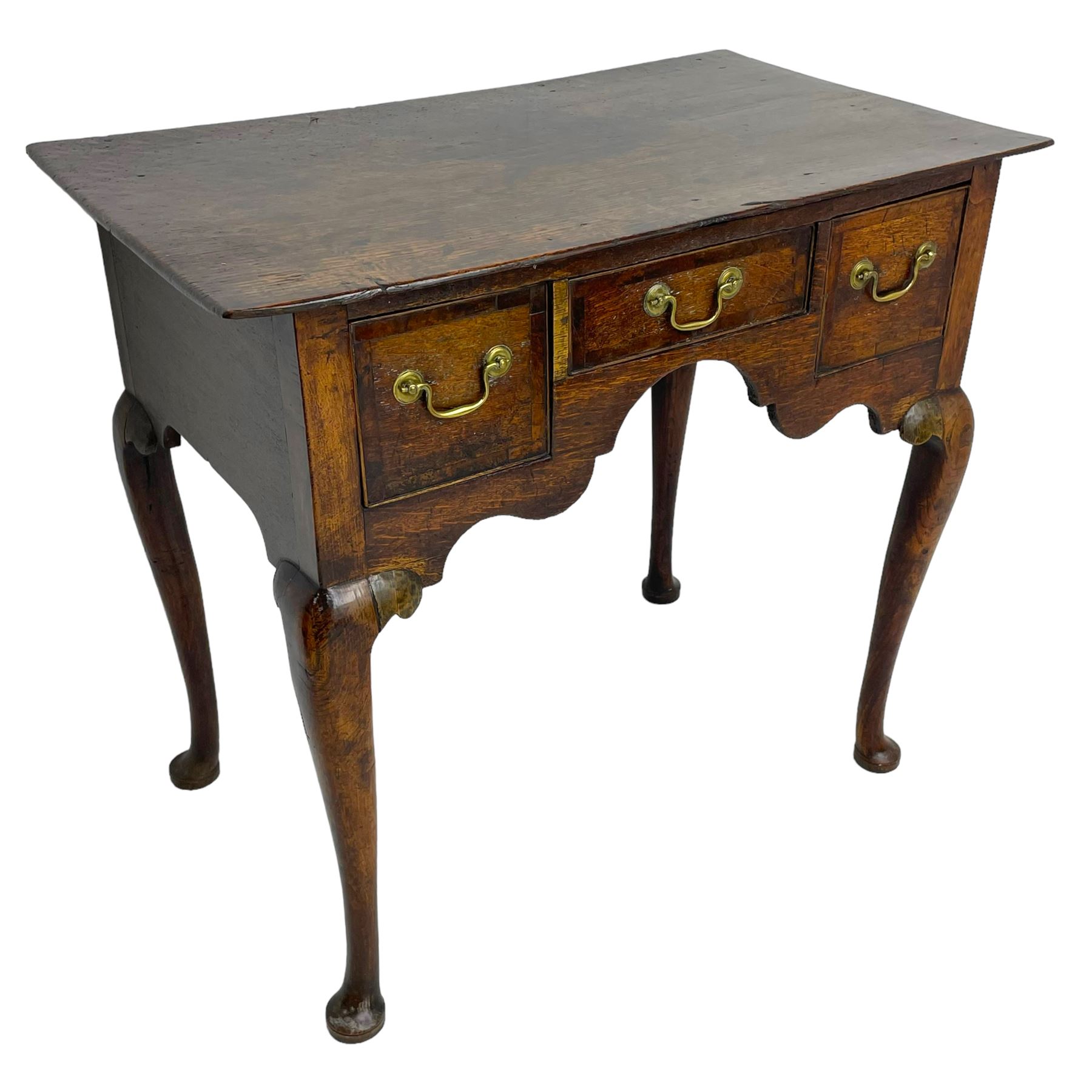 18th century oak low-boy, rectangular top over three crossbanded and cock-beaded drawers, ogee and stepped arch apron, on cabriole supports 