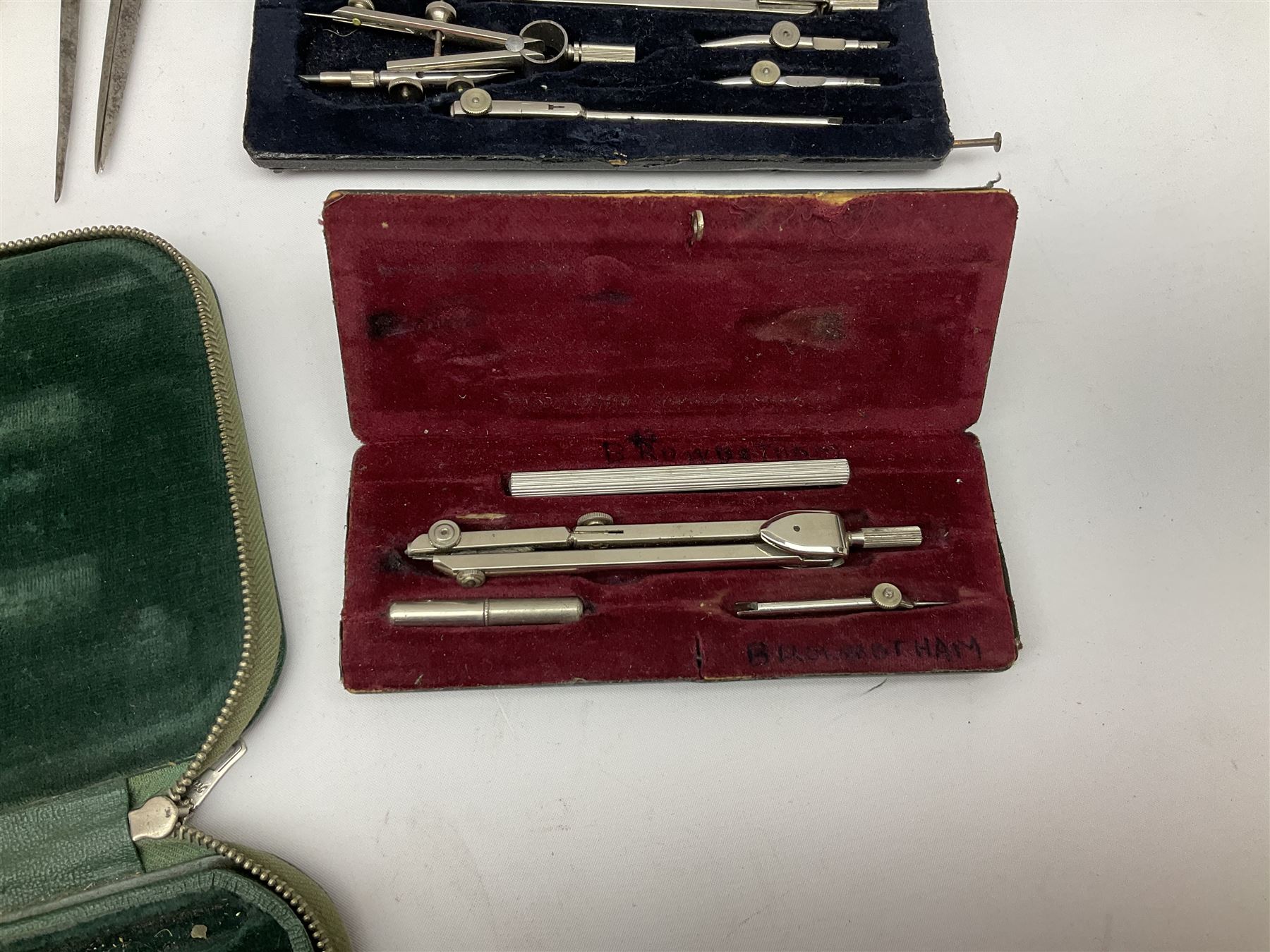 Negretti & Zambra drawing instrument set, the ruler with manuscript name 'F/Sgt. F. Hamilton R.A.F. 194(?)', cased; four other drawing instrument sets by Anker-Precision Germany, EcoBra, Temple etc, all cased; and quantity of loose drawing instruments