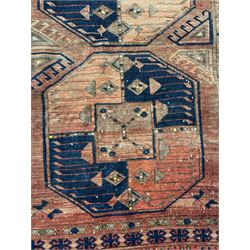 Turkish Kilim ground rug, the field with alternating horizontal bands of geometric patterns, bordered by repeating diamond motifs (145cm x 242cm); Turkish red ground rug, the field with three octagonal medallions (113cm x 172cm) (2)