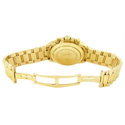 Jaguar gentleman's 18ct gold automatic chronograph wristwatch, white dial with mother of pearl subsidiary seconds dials, day-date aperture and baton hour markers, on 18ct gold bracelet, Swiss hallmarks