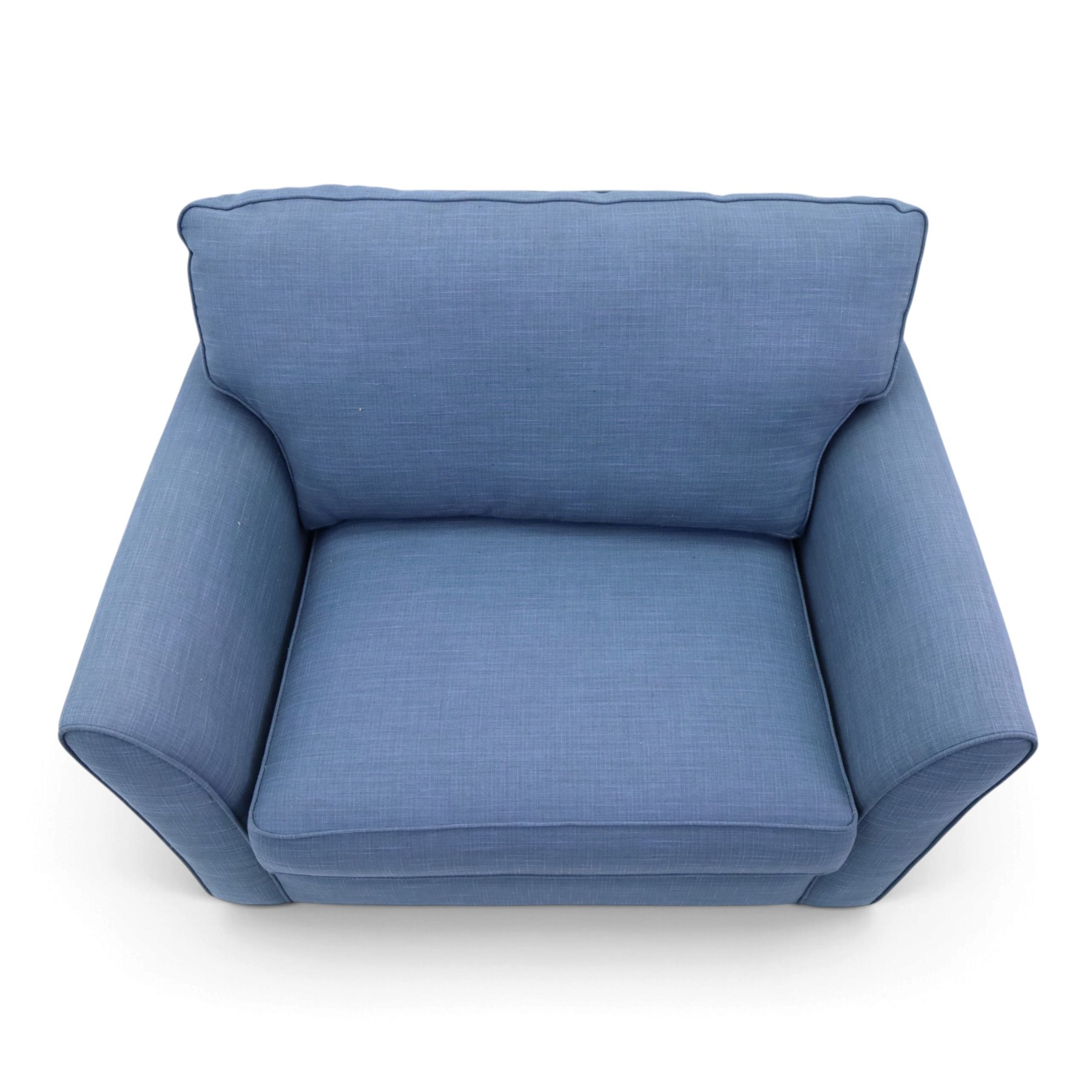 Contemporary blue small sofa bed, shaped arms with loose seat cushions, stowed bed beneath, raised on light wood feet