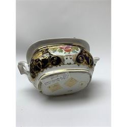 19th century New Hall tea wares, decorated in pattern no 2054, comprising three tea cups and three saucers, three coffee cups and three saucers, twin handled lidded sucrier, slop bowl, and two plates, decorated with floral sprays upon a cobalt blue border and heightened with gilt throughout

