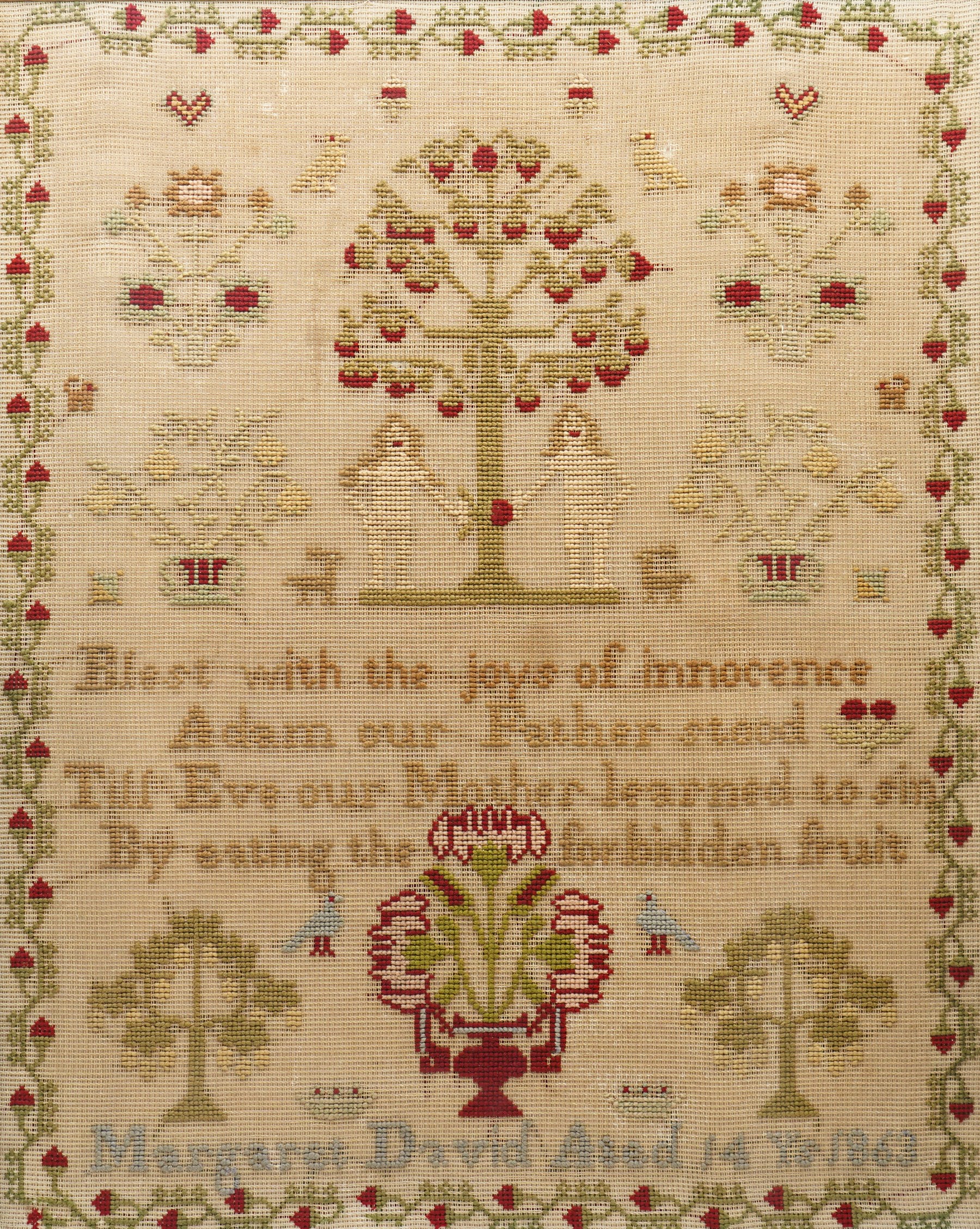 Victorian sampler, by Margaret David 1863, 'Blest with the joys of innocence, Adam our Father stood, Till Eve our Mother learned to sin, By eating the forbidden fruit', depicting Adam and Eve beneath a tree, in Birds Eye maple veneered frame, overall 90cm x 69cm 