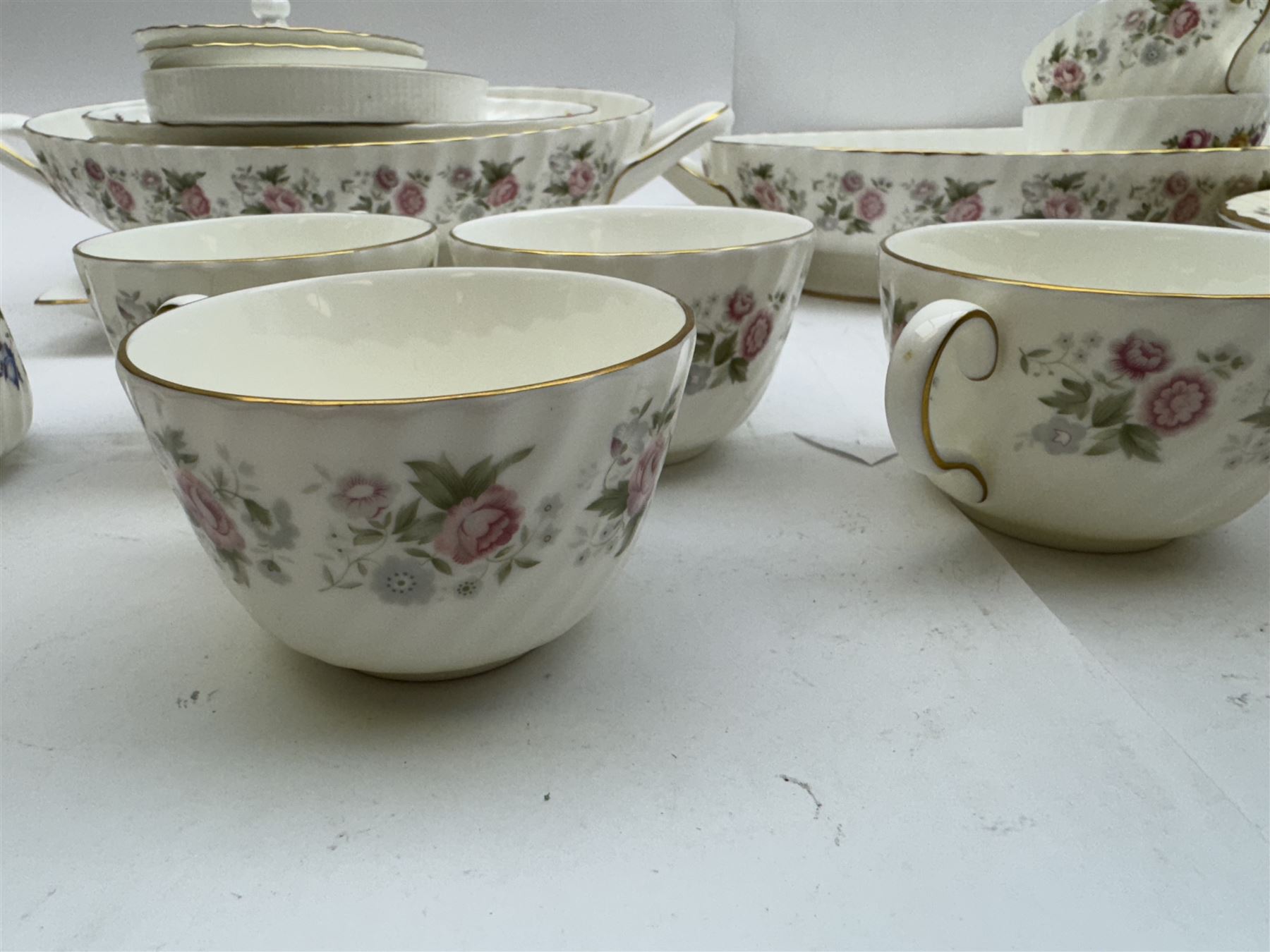Minton Spring Bouquet pattern part tea and dinner service, including six dinner plates, six side plates, two covered dishes etc, together with Minton Marlow pattern part tea service  