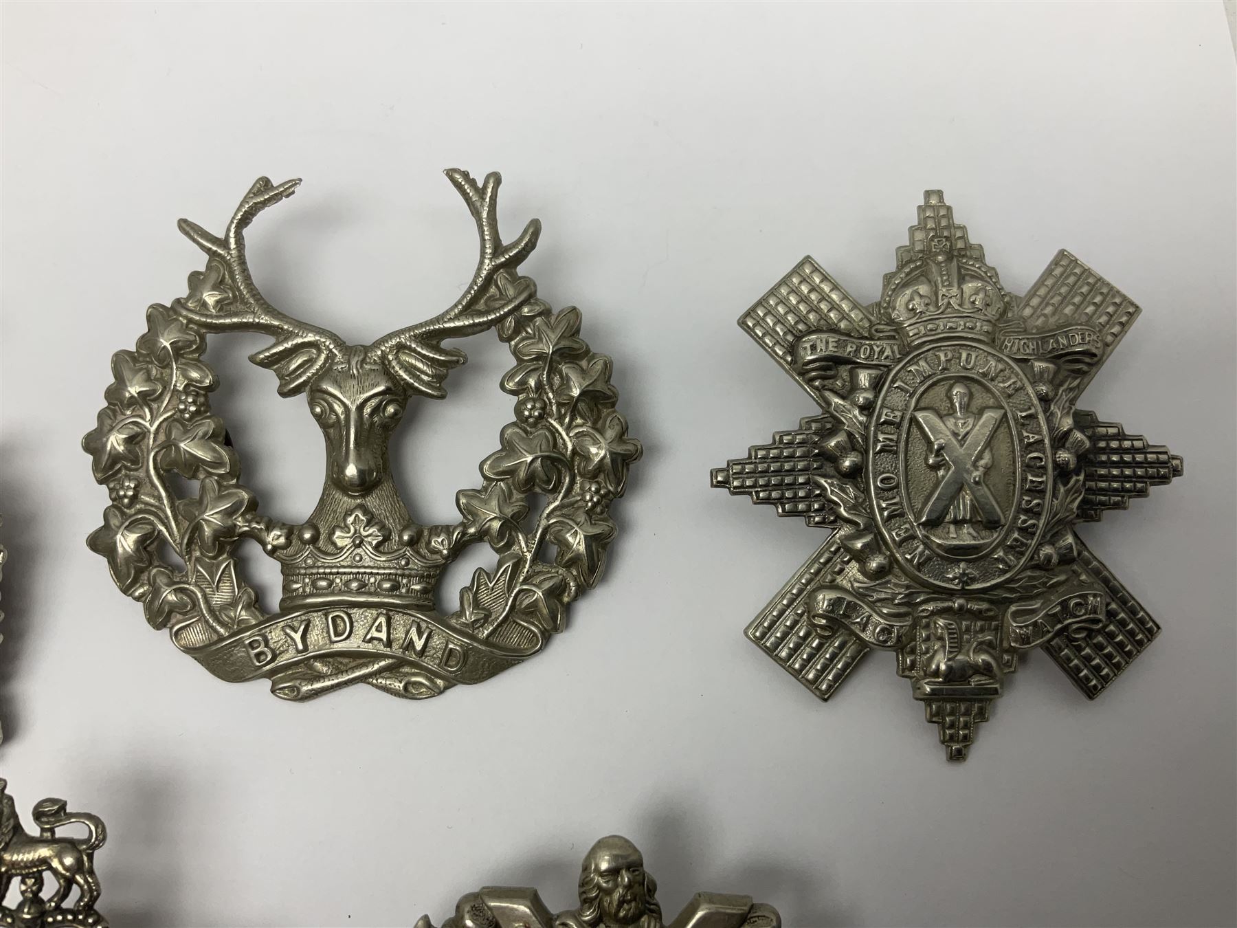 Thirteen Scottish metal Glengarry badges including Black Watch, Highland Regiment, Cameronians, Argyll & Sutherland, Seaforth Highlanders, Kings Scottish Own Borderers etc
