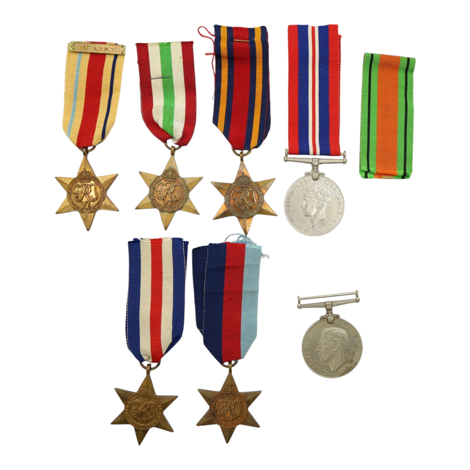 WWII British medals, comprising War medal, Defence medal, 1939-1945 Star, Burma Star, France and Germany Star, Italy Star and Africa Star 1st Army