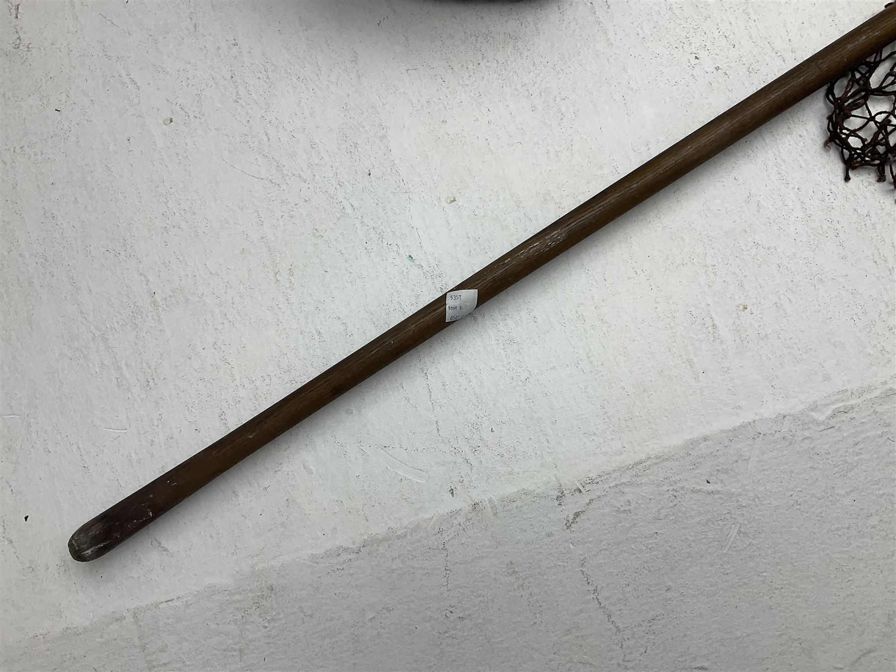 Fishing tackle and accessories housed in two wicker creels, including a landing net, fly tin, small brass reel, other reels to include two Intrepid Boy'o examples, crab lines etc 