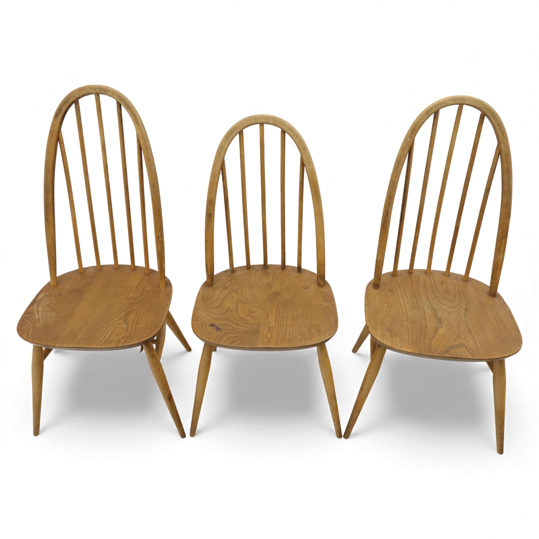 Ercol - set of three Quaker back dining chairs, two tall and one smaller hoop backed chairs