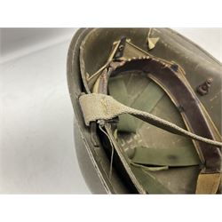 French Algerian War Red Cross steel helmet, marked 'CP ICA Esperaza 1955'; green finish with crudely painted Red Cross logo to the front