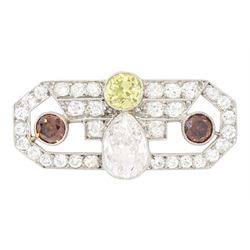 Early 20th century platinum diamond brooch, milgrain set with a pear cut faint brown diamo...
