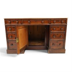 Victorian mahogany kneehole desk, rectangular top fitted with central frieze drawer over recessed cupboard, flanked by four graduating drawers to each side, on skirted base