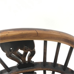  Pair 19th century yew and elm Windsor chairs, traditional twin hoop construction with pierced vase shaped splats and shaped seats on turned supports with crinoline stretchers, probaby North East Midlands or Lincolnshire, (2)  