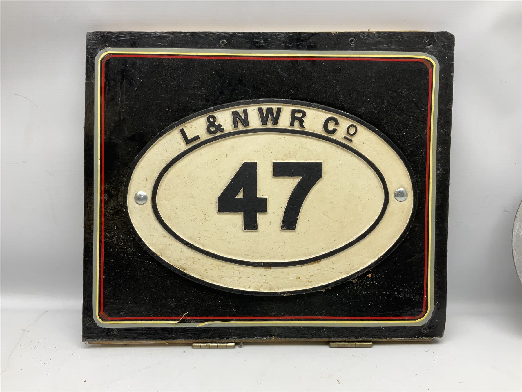 Railway Interest; Cast iron LNWR railway bridge plate, together with cast iron sign ' Nevers S.N.C.F 040.TX.47' and reproduction Great Eastern Railway cast metal wall plaque