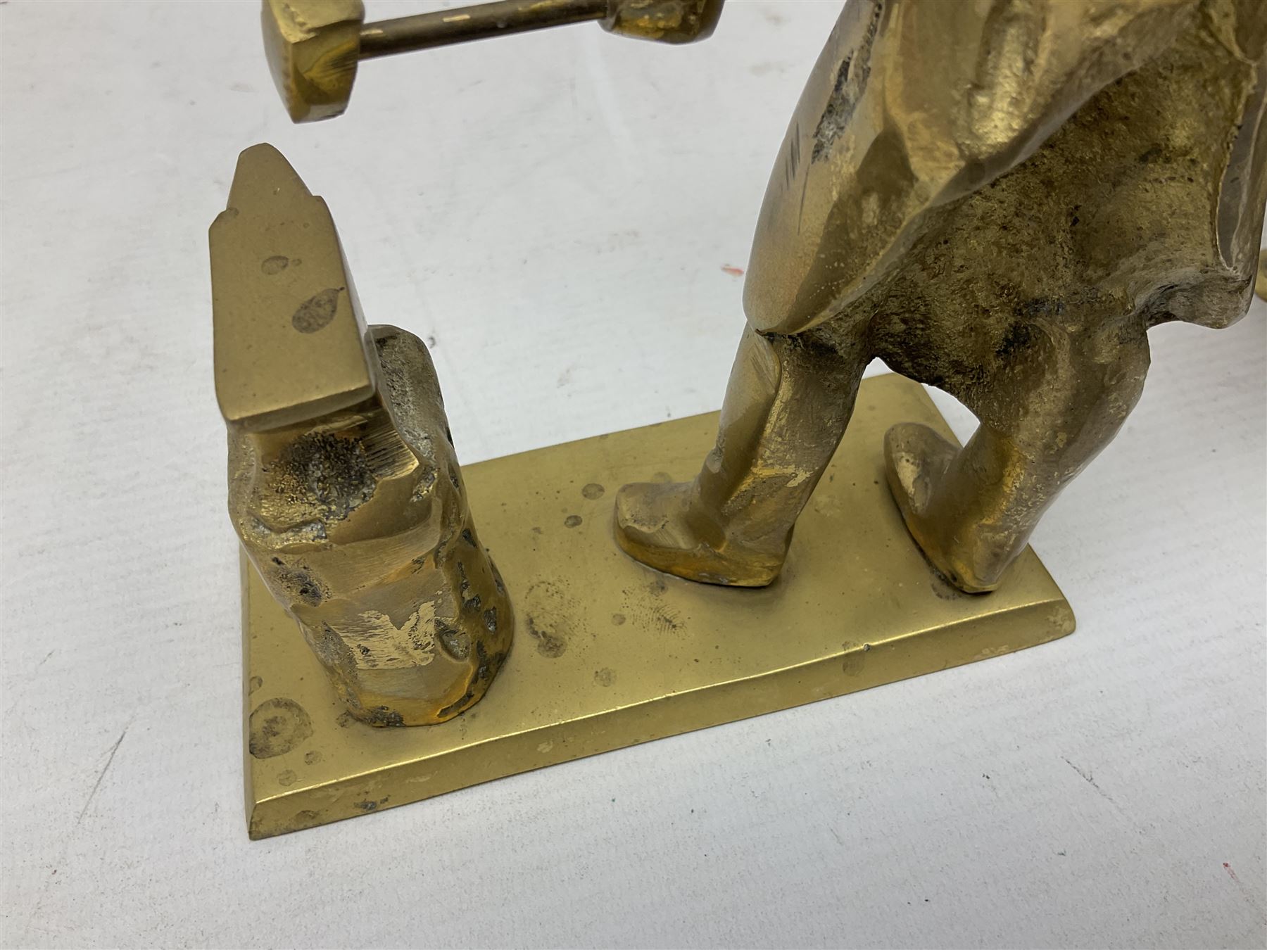 Large brass figure of a hereford bull, together with a brass figure of a blacksmith, bull H15cm