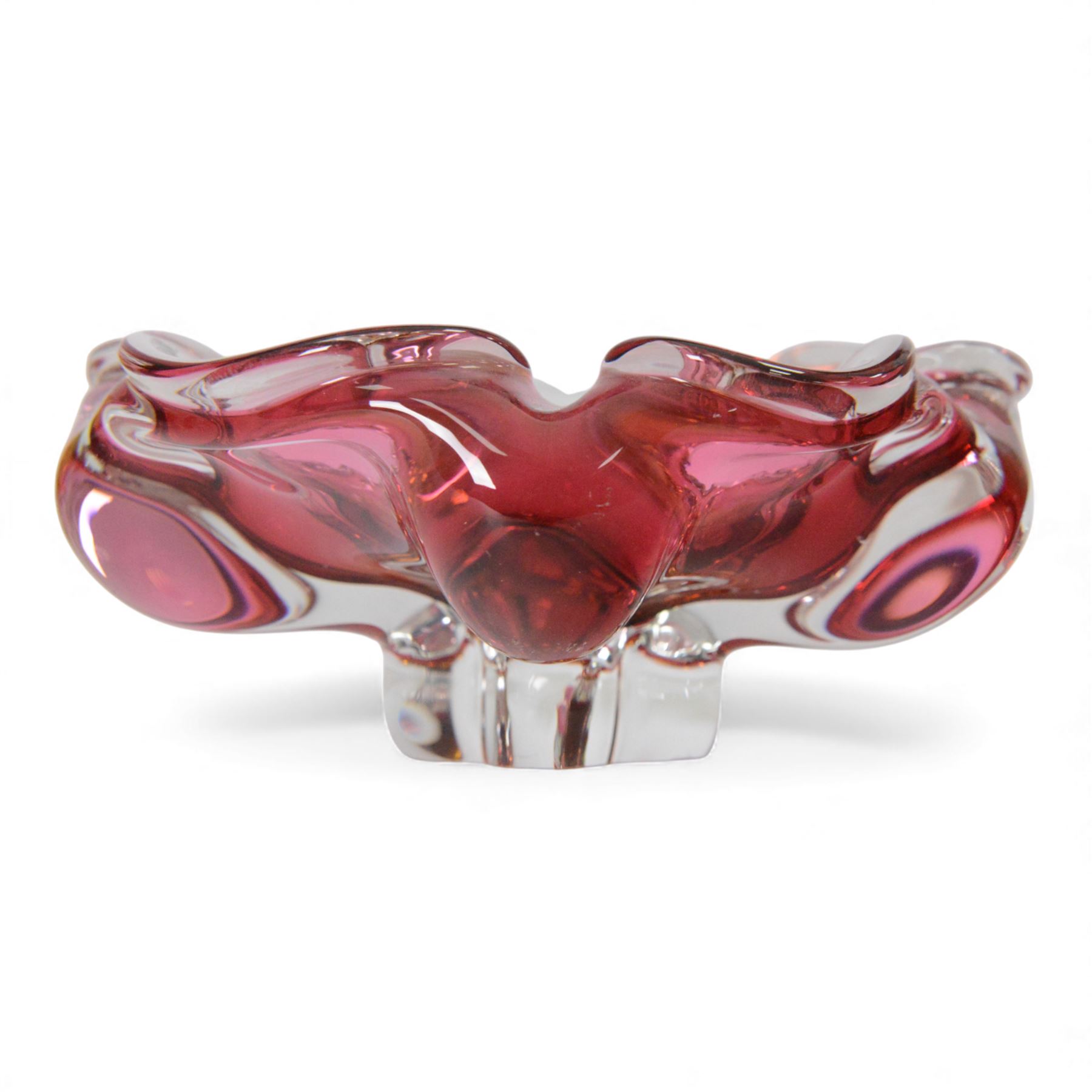 Collection of art glass, including star dish, flower example with bubble inclusions 