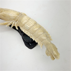 19th century Japanese carved ivory model of a crayfish, with accompanying wooden stand, L20cm
