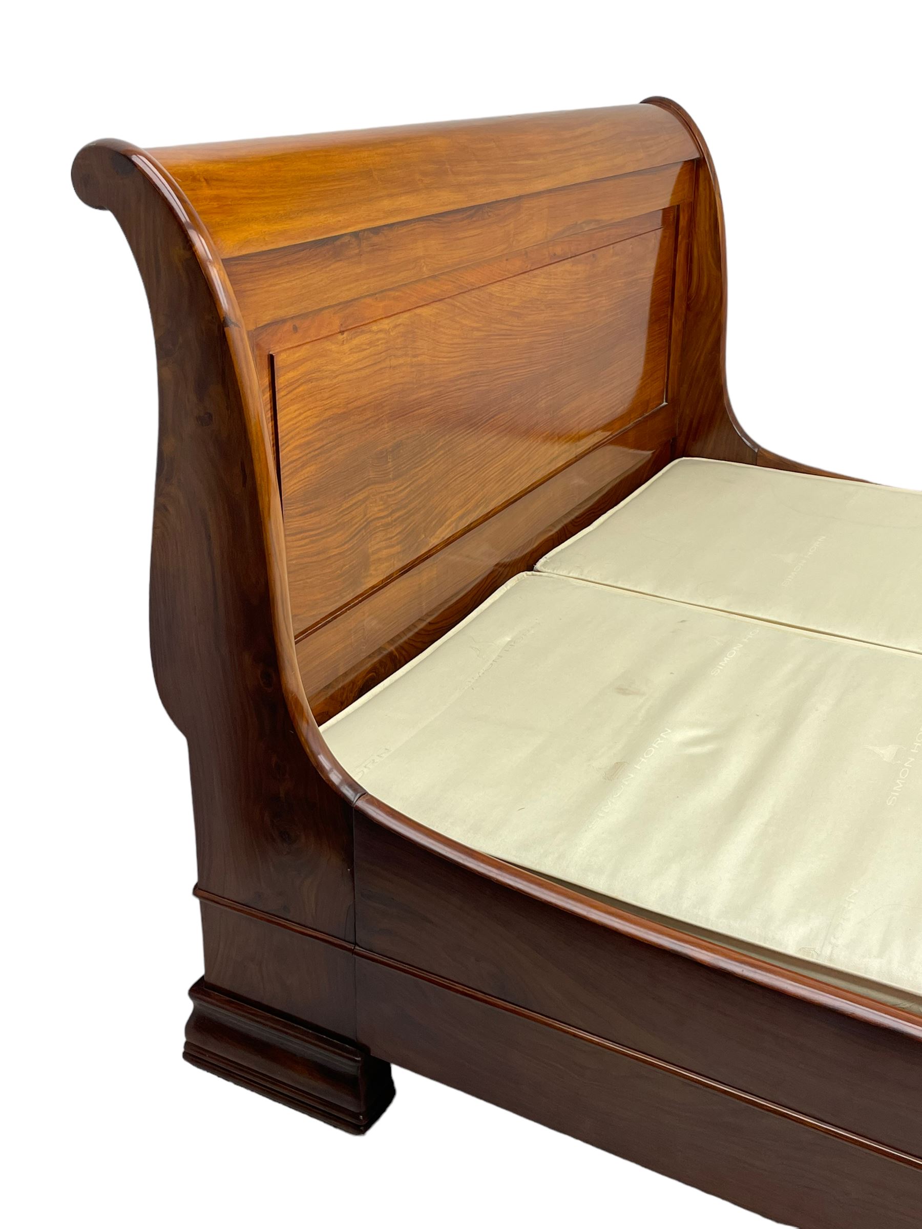 Simon Horn - 'Chatsworth' hardwood 5' 3'' Queen-size sleigh bed or lit bateau, panelled head and footboard with scrolled frames, on moulded block feet, with upholstered base
