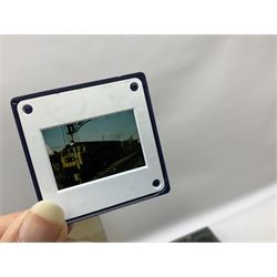 Approximately two hundred and thirty railway related locomotive colour slides, in two slide boxes