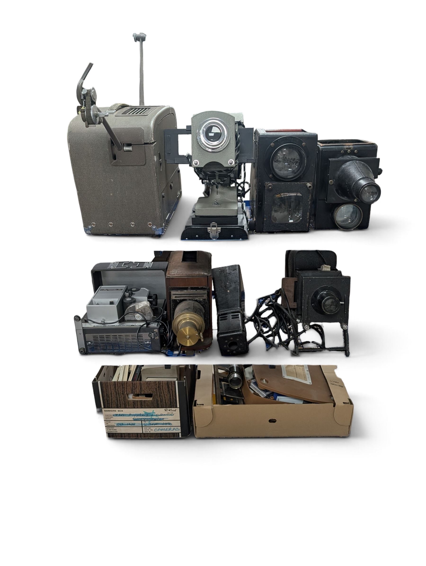 Collection of projectors, epidiascopes, magic lantern and similar, including Bell & Howell 621 projector, mahogany and brass magic lantern, Helper 6S projector, Leitz epidiascope, Zeiss epidiascope, Johnson Optiscope, etc