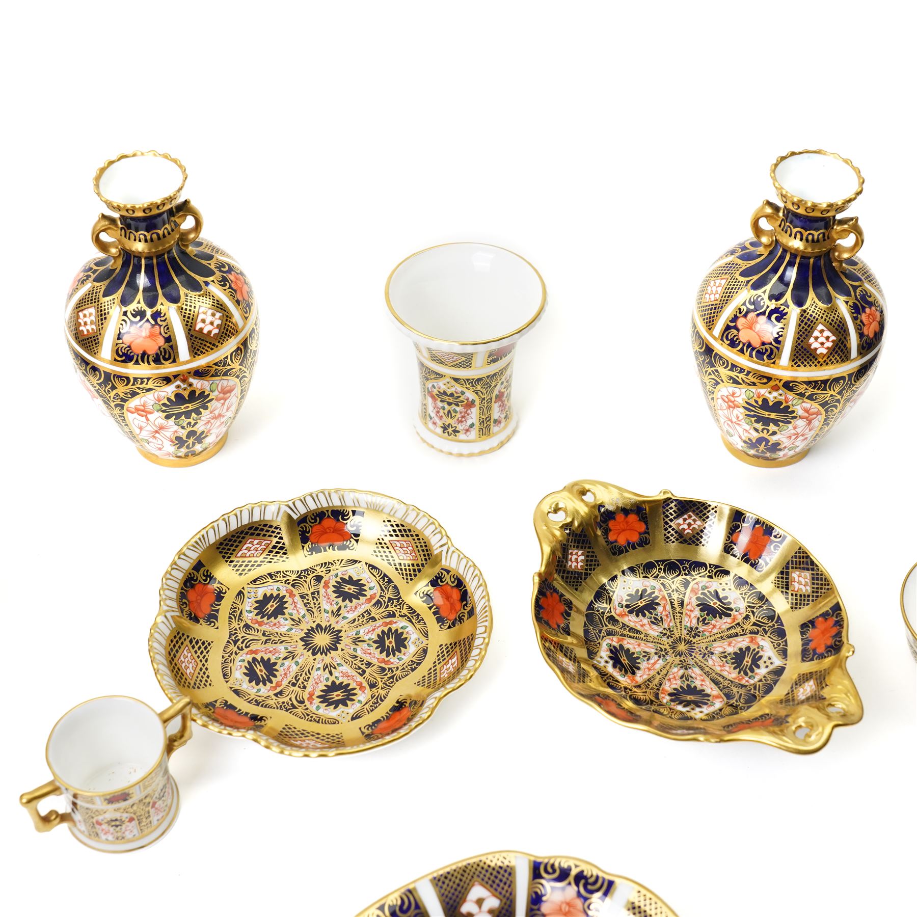 Mixed Royal Crown Derby Imari pattern 1128 wares, to include two Golden Primrose vases, both boxed, 8.5cm; five petal tray, boxed, D11.5cm, sweet tray, D13cm, miniature loving cup, boxed, and a miniature vase, H6cm etc (10)