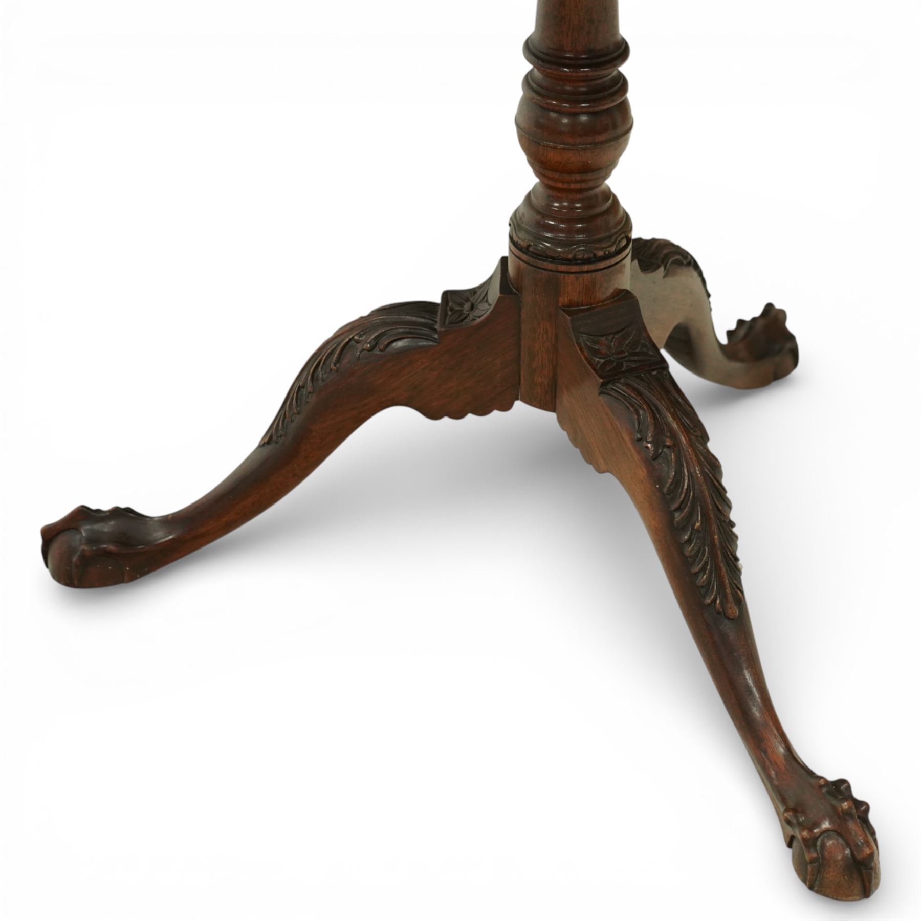 Late 19th century Rococo Revival mahogany occasional table, with shaped circular top with ornate lattice-pierced edge, decorated with pierced scallop motifs and acanthi, raised on a birdcage movement over turned pedestal, terminating to foliate-moulded tripod base with ball and claw feet