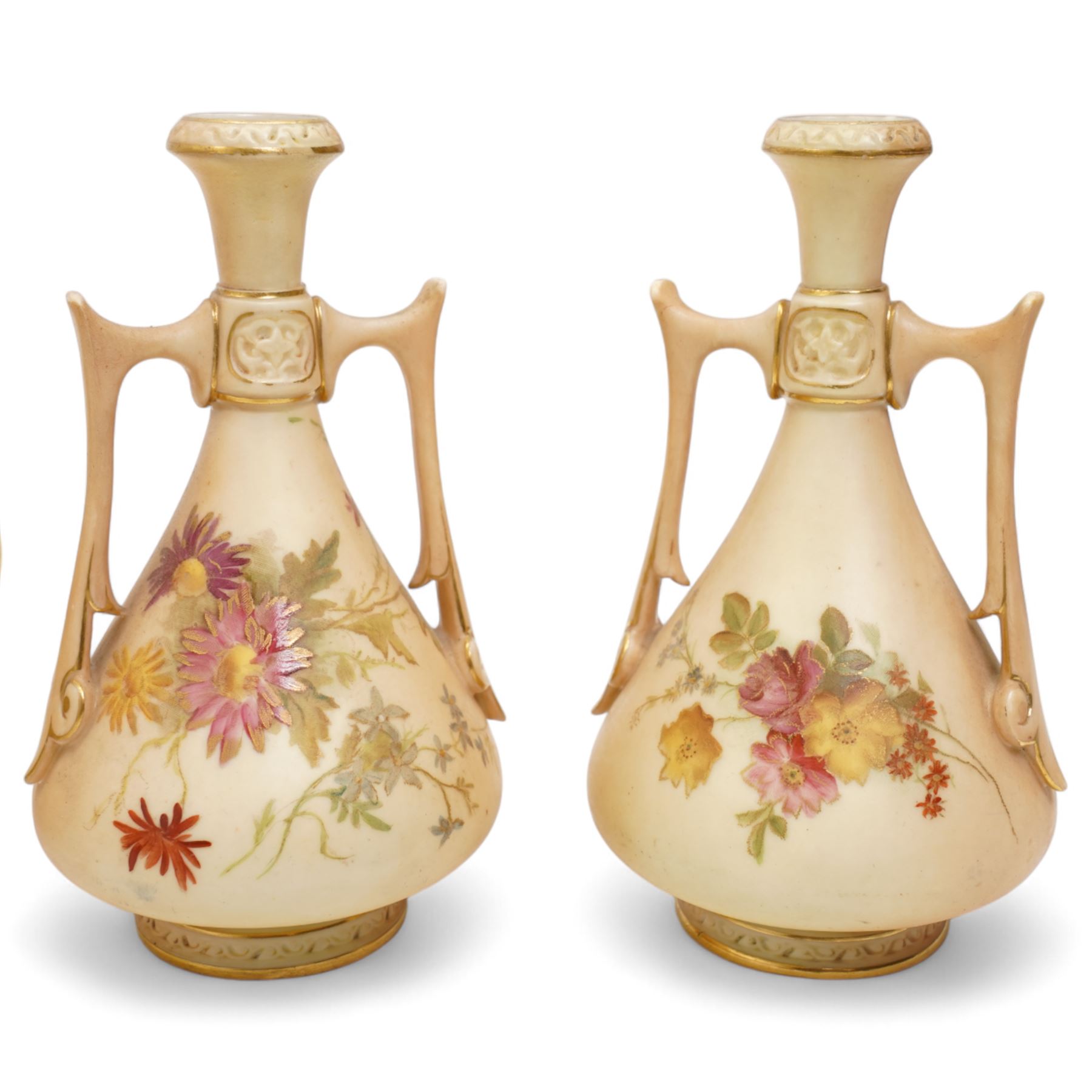 Royal Worcester blush ivory porcelain to include a pair of jugs, no. 1094, pair of vases, no. 1021, and a small ewer no. 1094 (5)