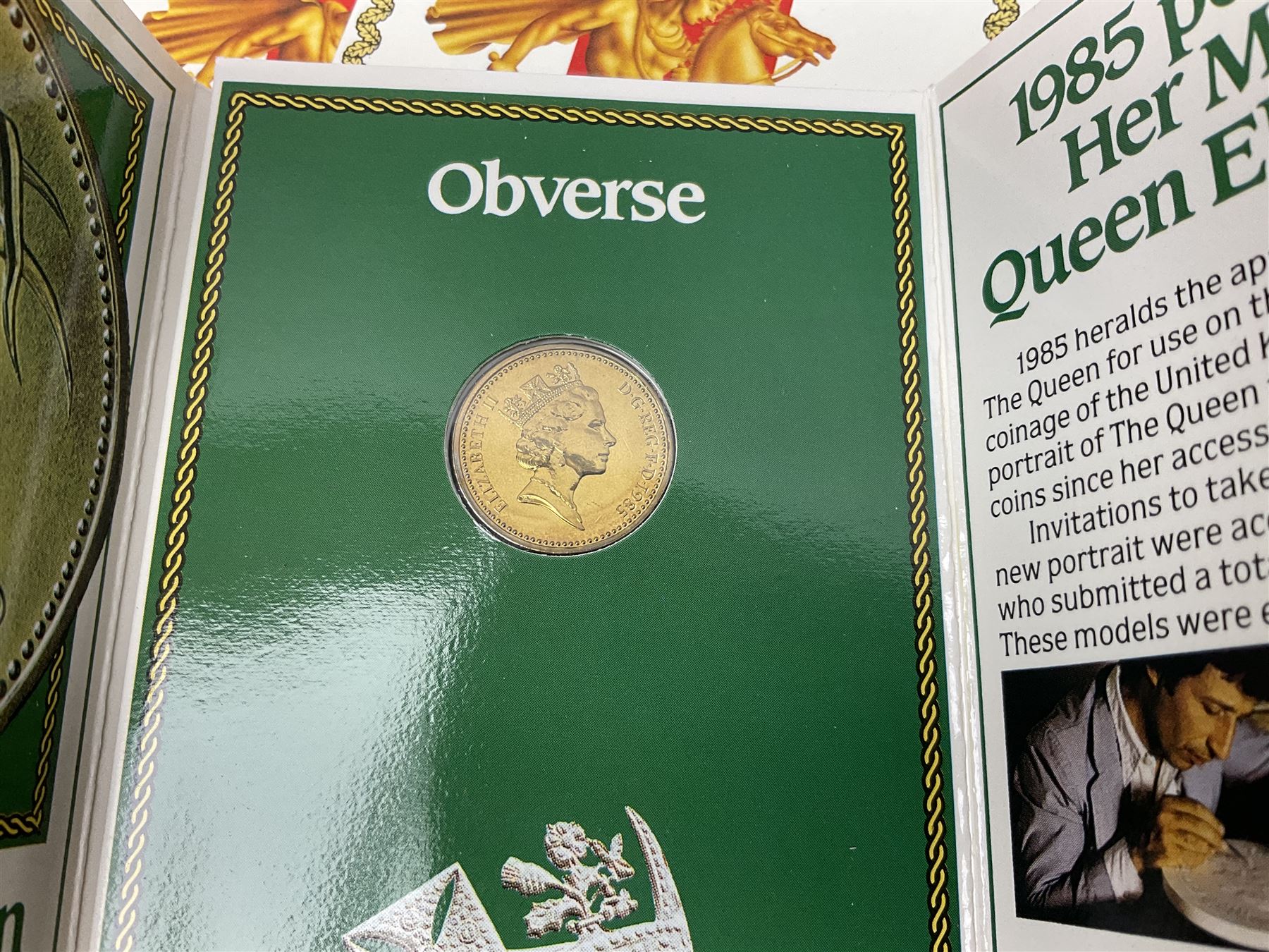 Two Great Britain and Northern Island proof sets dated 1970 and 1971, both with card cases, three 1986 Commonwealth Games commemorative two pound coins, in card folders, and six brilliant uncirculated one pound coins, in card folders