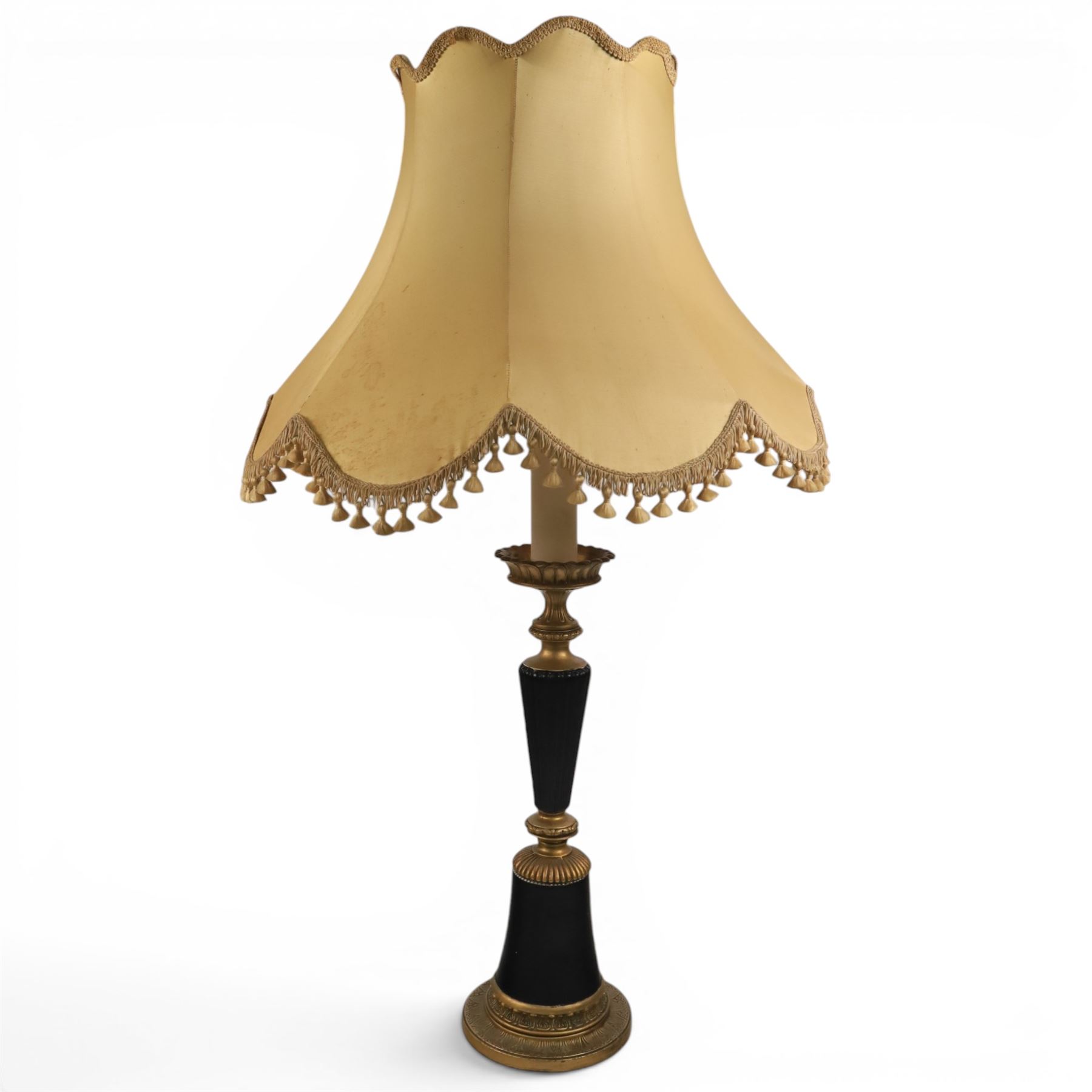 Neoclassical style table lamp, with conical stem upon a circular base, with gold lampshade with tassel trim, H82cm without shade