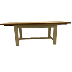 Solid oak and painted pine rectangular dining table, extending with additional centre leaf