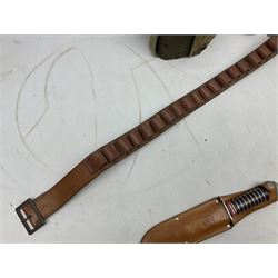 Mundial Brazil bowie knife, the 15.5cm steel blade inscribed 'Sheriff Knife', with banded and aluminium hilt; in leather sheath L29cm overall; British Army felt covered metal water bottle with webbing strap; leather 12-bore cartridge belt; and small pair of non-military binoculars in part case (4)