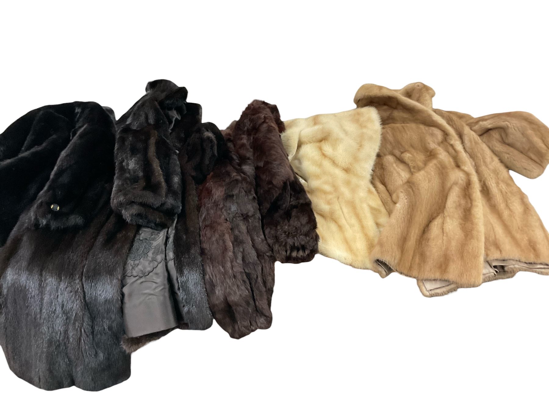 Four fur coats including two mink