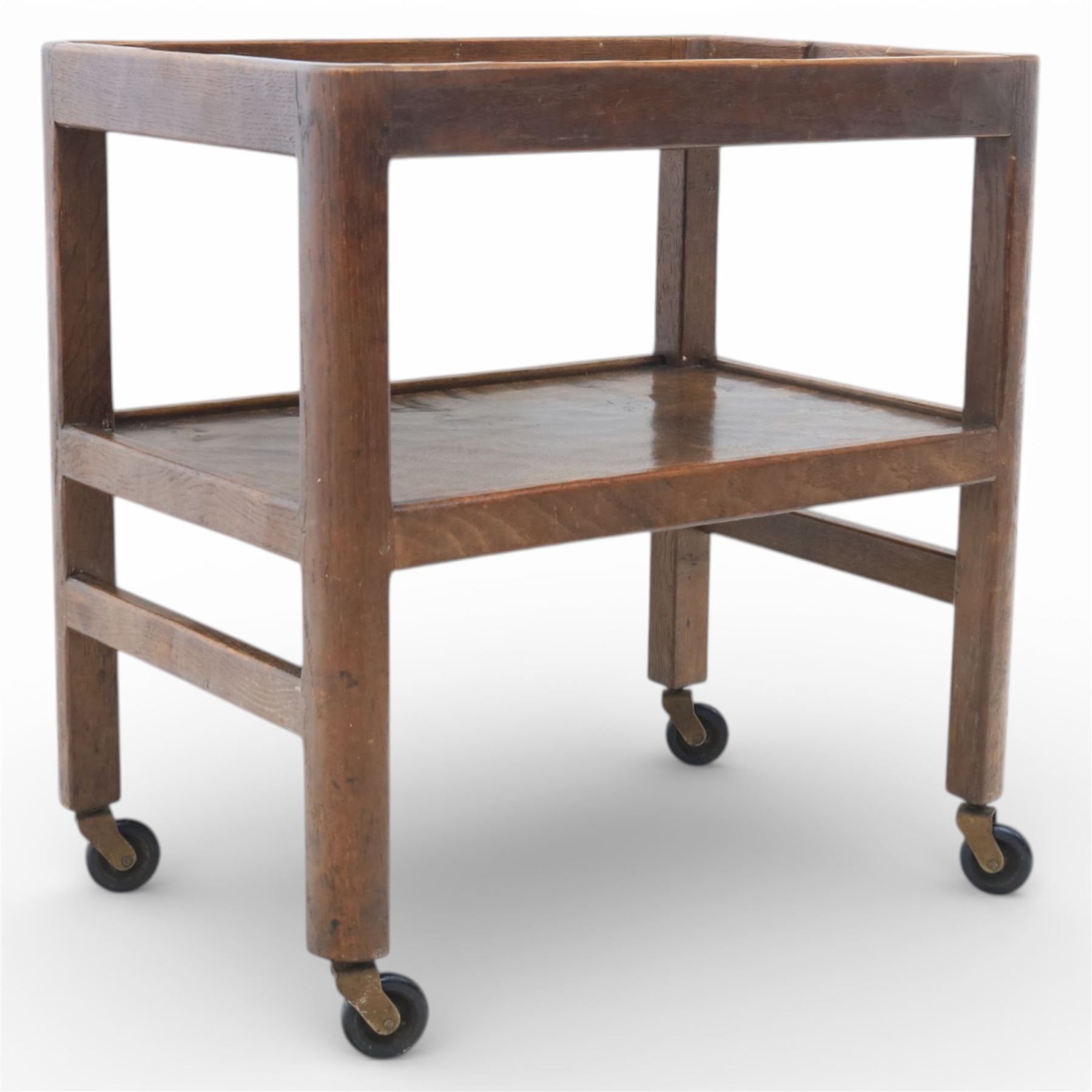 Yorkshire oak dark stained tea trolley, adzed two tier table, raised on castors