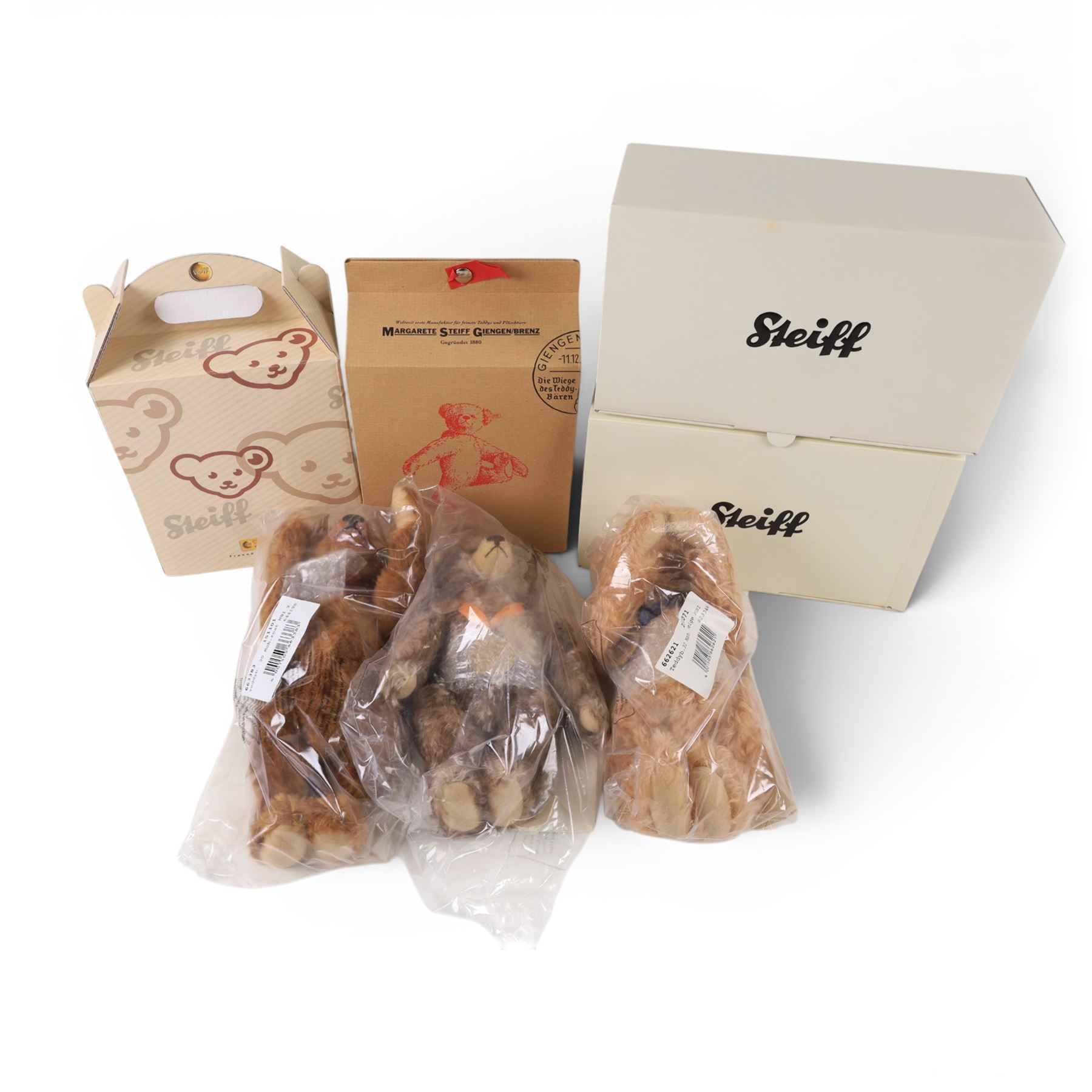 Four Steiff jointed mohair teddy bears, all with medallions, buttons in ear and tags, as new in boxes and unopened plastic bags, H28-30cm