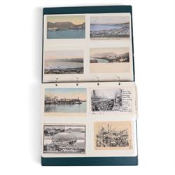 Collection of mid 20th century and later African postcards, including railways, Victoria Falls, Tribes, village scenes, etc, some blank and some with written messages, housed in two albums