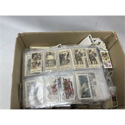 Album of Wills cigarette cards containing sets of Naval Dress & Badges, Fish & Bait, Aviation and Arms of the British Empire; twenty individual Wills albums; and large quantity of loose cigarette and trade cards