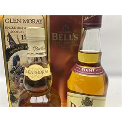 Glen Moray 12 Year Single Malt Highland Scotch Whisky, 70cl 40% vol, one bottle, in Highland Regiments The Black Watch presentation tin, Glenfiddich Pure Malt Scotch Whisky, Special Old Reserve, 70cl 40% vol, one bottle, in Clan Murray presentation tin, Bell's Extra Special Old Scotch Whisky, Aged 8 Years, 70cl 40% vol, one bottle, in box and Bell's Extra Special Old Scotch Whisky, 1l, 43% vol (4)