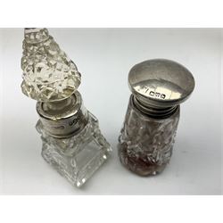 Quantity of glass scent bottles and dressing table jars to include seven hallmarked silver collared and lidded examples, to include collared example stamped Birmingham 1910, along with similar metal mounted examples 