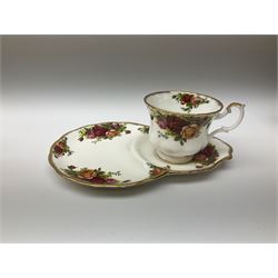 Royal Albert Old Country Roses pattern tea set, comprising teapot, coffee pot, six teacups and six saucers, five side plates, further teacup with joined saucer and side plate, open sucrier, milk jug, cake plate, and preserve pot and cover, together with Royal Albert Jubilee Rose pattern sauce boat and stand, and Royal Albert Lavender Rose pattern cake stand. 