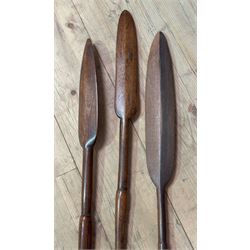 Set of three African carved hardwood spears, largest L128cm